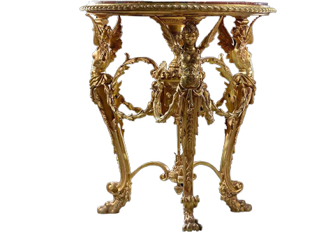 A unique Italian early 19th century Louis XV style fine cast gilt-ormolu center table, the circular marble top inset a beaded frieze raised above three fine winged caryatids connected with laurel circular garlands terminating with acanthus leaves and sea shells attached to a central pendant support cone of prosperity with a column extended below to a leafy pine cone finial issuing a scrolled x-stretcher connects the three legs, The S shape turning legs stand on leafy paw feet